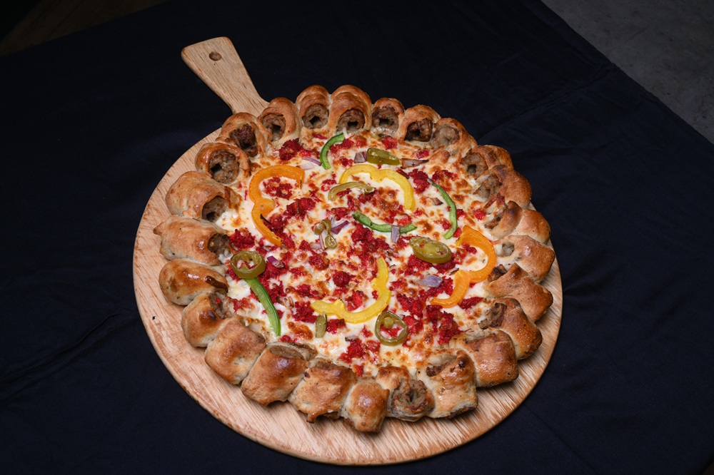 Stone-baked pizza from Pollo Ranch