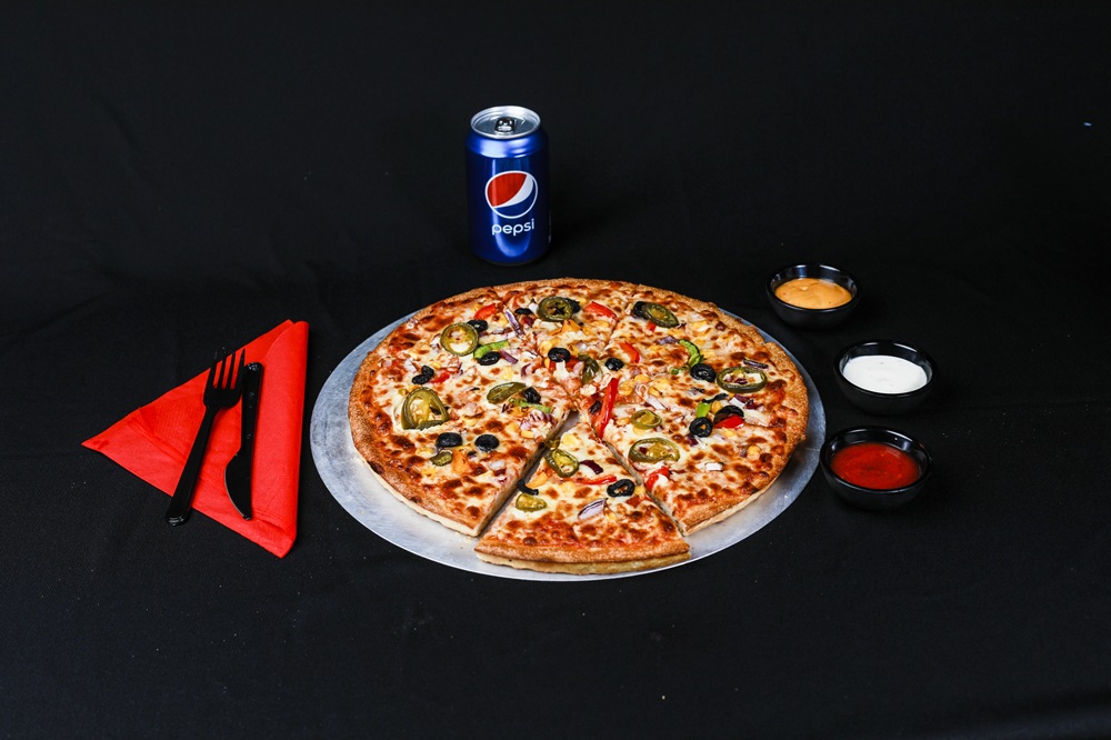 Stone-baked pizza from Pollo Ranch