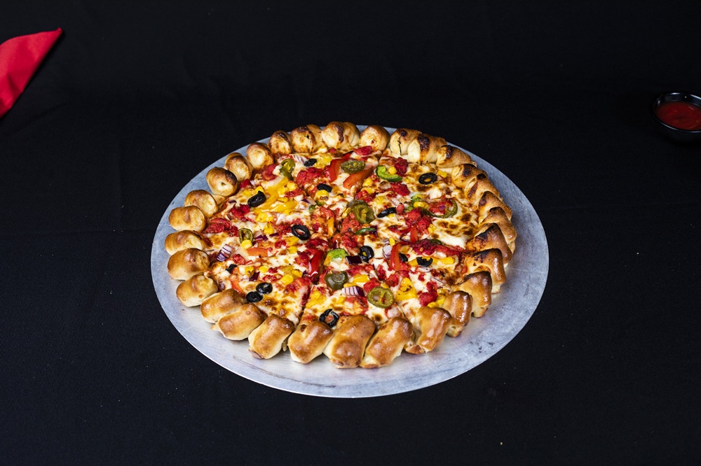 Cheesy bites crust detail at Pollo Ranch